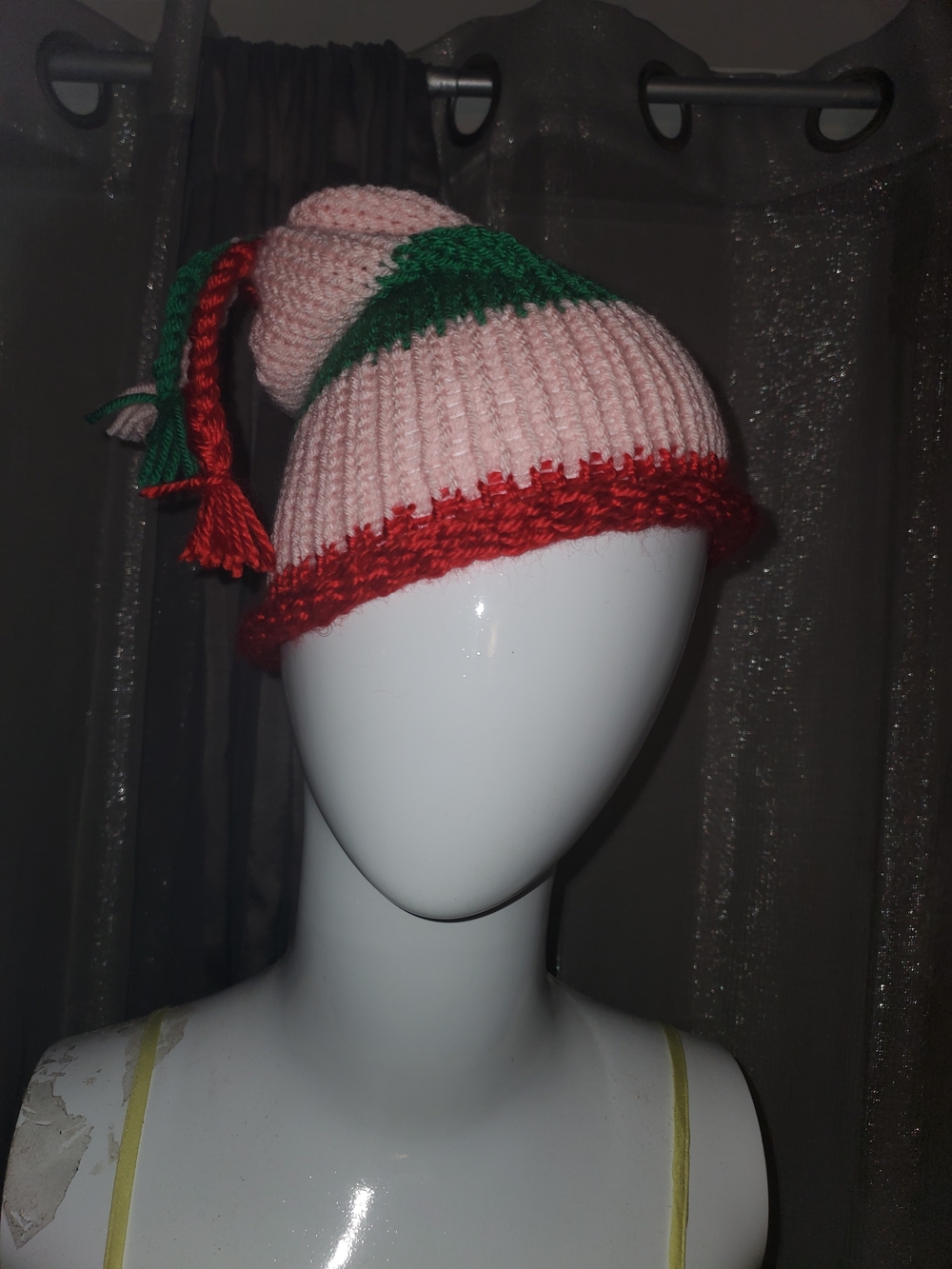 Women's Pink Knit Tassel Beanie with Red Trim and Green Accent